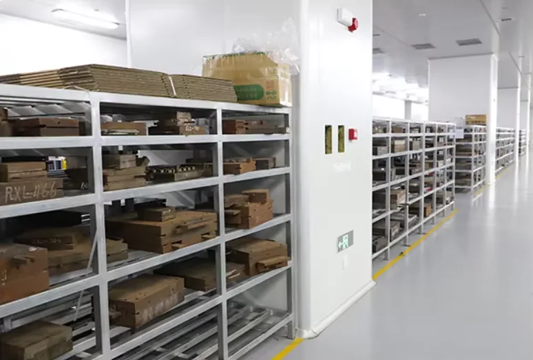 Silicone product molds stored on labeled workshop shelves