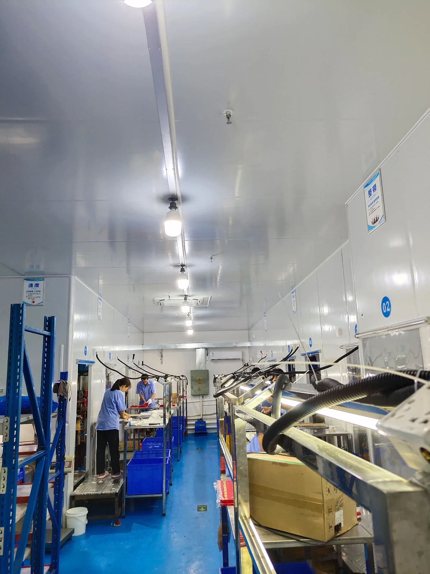 Aisle between rows of silicone production equipment